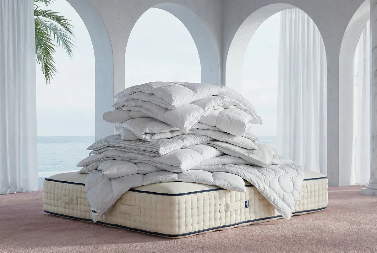 Dekbed dat ruim over de randen van het matras valt