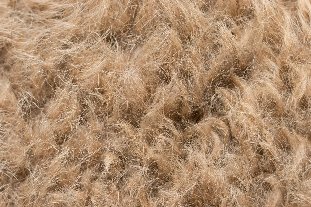 Natuurlijke dierlijke vezels: wol en kameelhaar van dichtbij